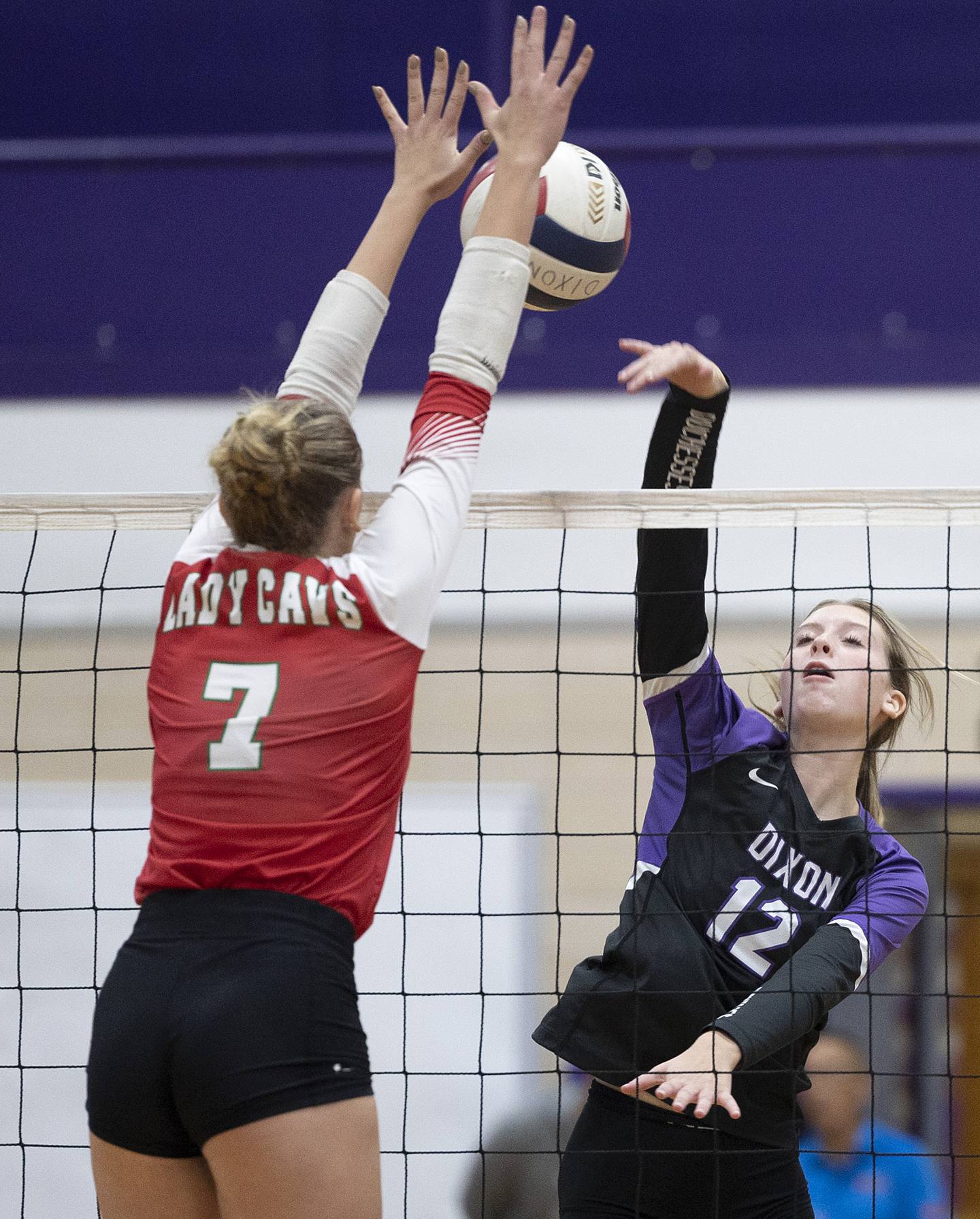 Dixon’s Izzy Queckboerner plays a shot against LaSalle-Peru’s Aubrey Duttlinger Wednesday, Sept. 10, 2025.