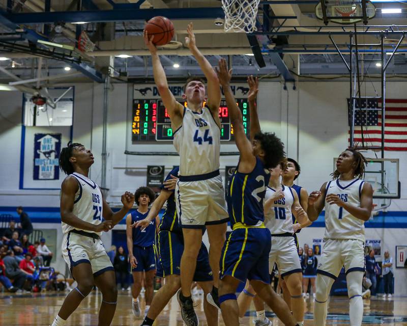 Downers Grove South's Justin Sveiteris (44) puts up a shot during basketball game between Leyden at Downers Grove South. Feb 9, 2024.