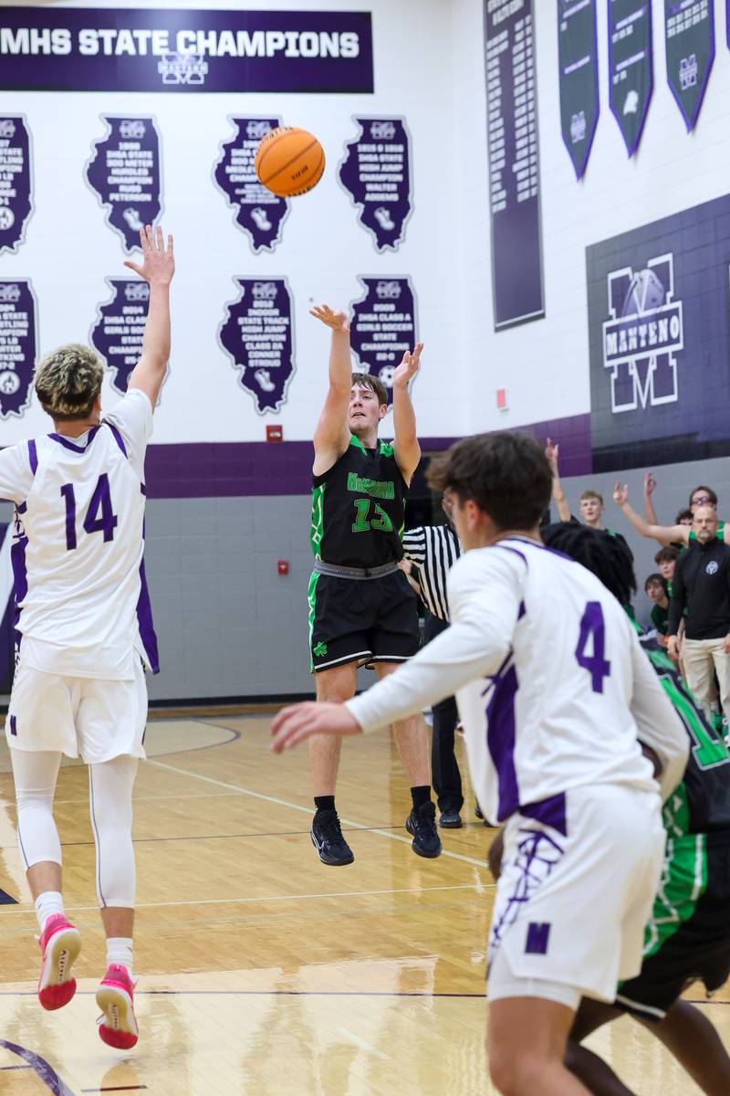 Bishop McNamara's Teddy Fogel puts up a 3-pointer during the Fightin' Irish's 61-24 victory over Manteno on Tuesday, Jan. 13, 2026.