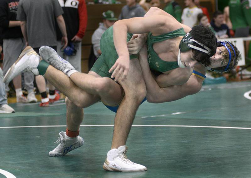 St Bede’s Logan Pineda tries to throw down Evan Cox in the #150 Championship match Saturday at Seneca