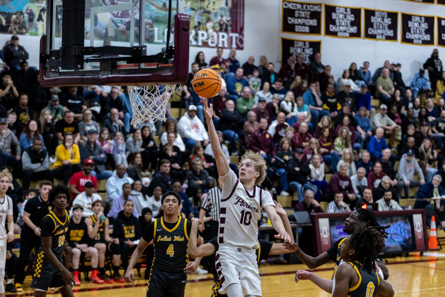 Lockport's Nojus Venckus goes for a layup during the IHSA 4A regional boys basketball championship against Joliet West at Lockport Township High School East Campus on Feb. 27, 2026.