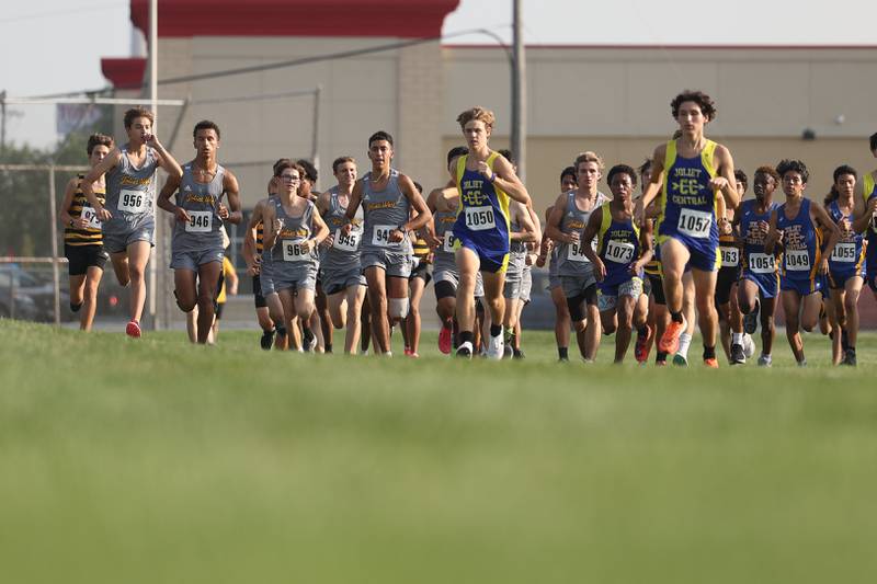 Joliet West and Joliet Central runners take off in the Joliet West Cross Country Dual Meet on Monday, Aug. 28, 2023 in Joliet.