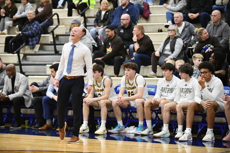 Joliet Catholic Academy head coach Adam DeGroot yells to his players during the Hilltoppers' 79-67 loss to Bishop McNamara in the IHSA Class 2A Peotone Sectional semifinal on March 4, 2025.