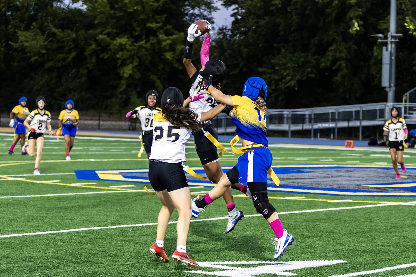 Joliet West's Tamia Saunders makes an interception during a varsity flag football game against Joliet Central at Joliet Central on Oct. 2, 2025.