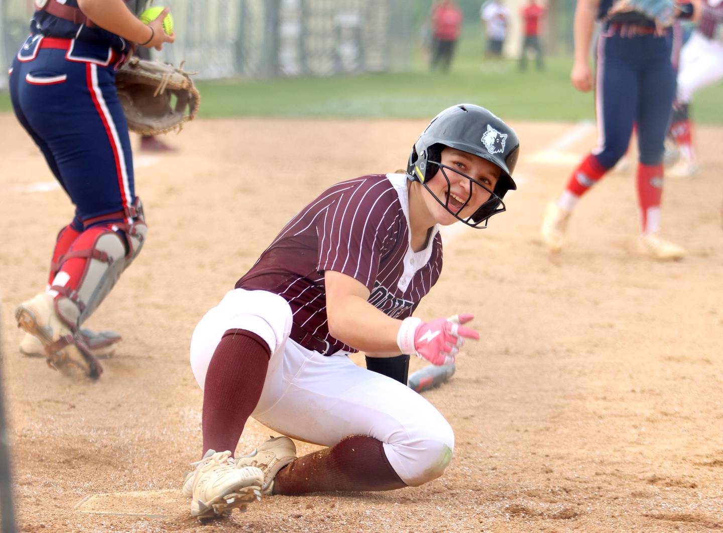 Prairie Ridge’s Emma Dallas reacts after being called safe on a play at home against Belvidere North in IHSA Class 3A Sectional Semifinal softball action at Sycamore High School in Sycamore on Thursday, June 5, 2025.