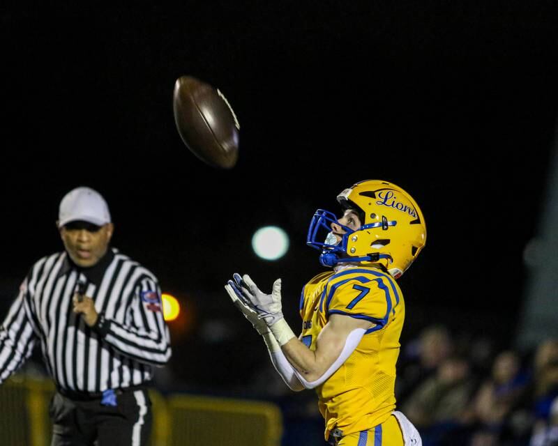 Lyon's Danny Carroll (7) fields a kick during Class 8A quarterfinal football game between Naperville Central at Lyons on Friday, Nov 15, 2024  in Western Springs.