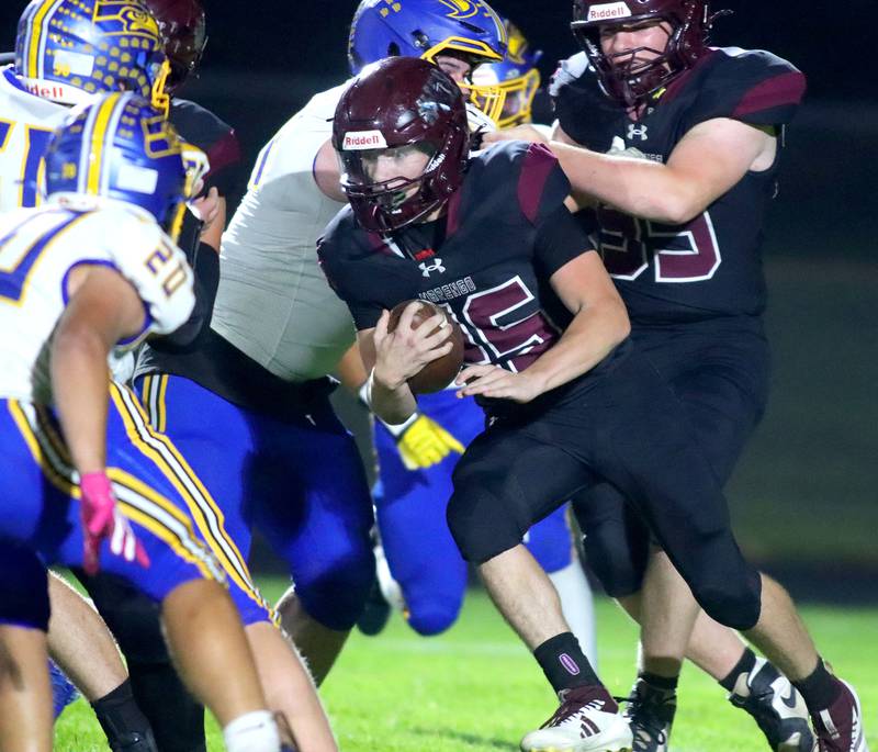 Marengo’s Logan Boley runs the ball against Johnsburg in varsity football at Rod Poppe Field on the campus of Marengo High School in Marengo on Friday, Oct. 3, 2025.