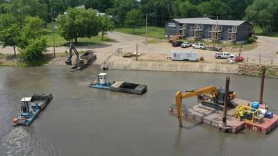 Photos: A look at the dredging operations at Henry Marina