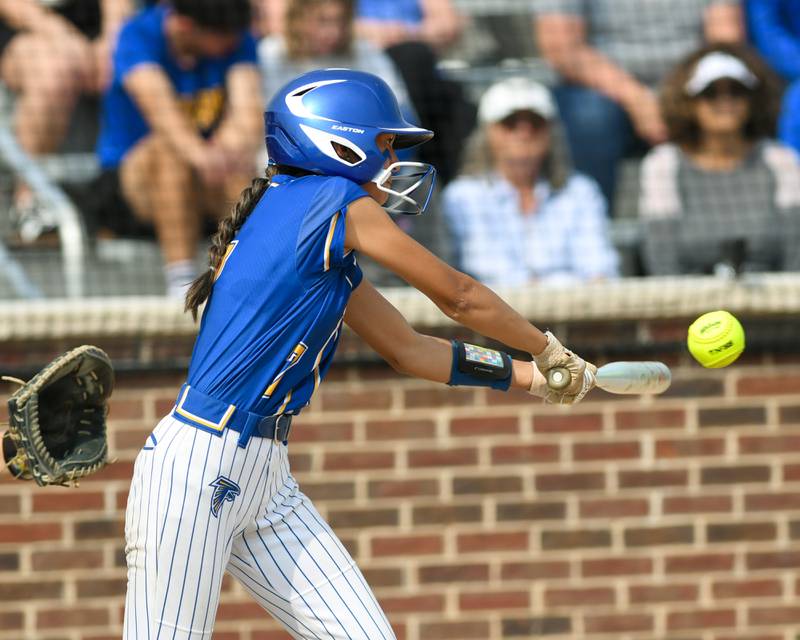 Wheaton North's Hana Stoner (7) makes contact with the ball during the sectional semifinal game on Thursday June 5, 2025, while taking on Weaton Warrenville South held at Oswego High School.