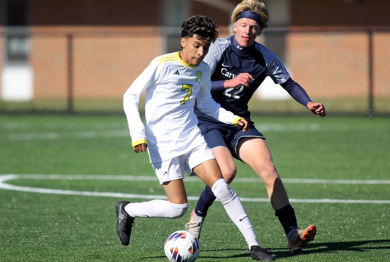 Cary-Grove’s Bryce Nordengren, right, races Harvard’s Gerardo Garcia for the ball in IHSA Class 2A Regional Title Game soccer action on Saturday, Oct. 26, 2024, at  Harvard Junior High School  in Harvard.