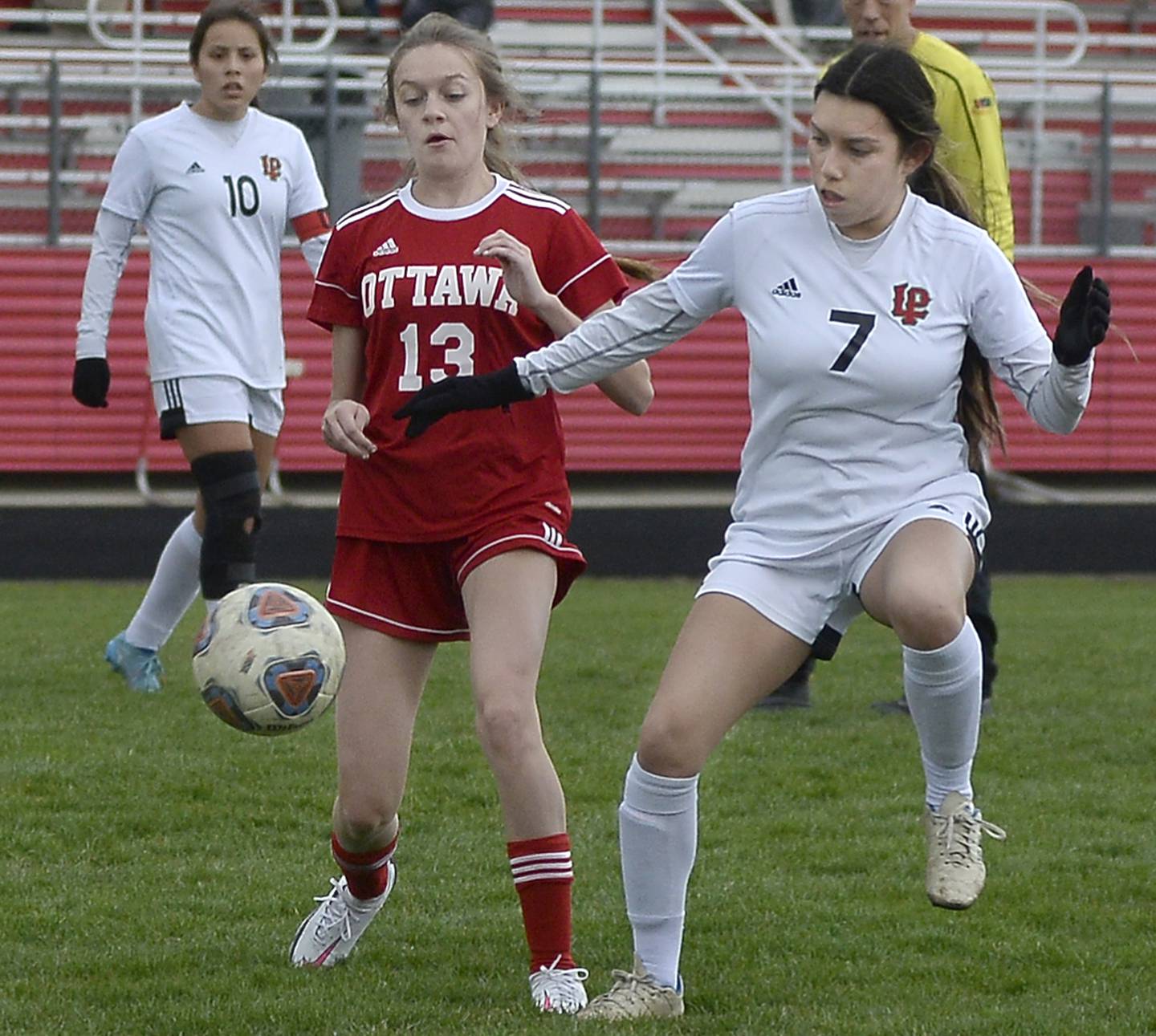 Ottawa’s Ari Bodhaine and La Salle-Peru's Genesis Garcia both work to control the ball during the first half of Wednesday's match at King Field in Ottawa.