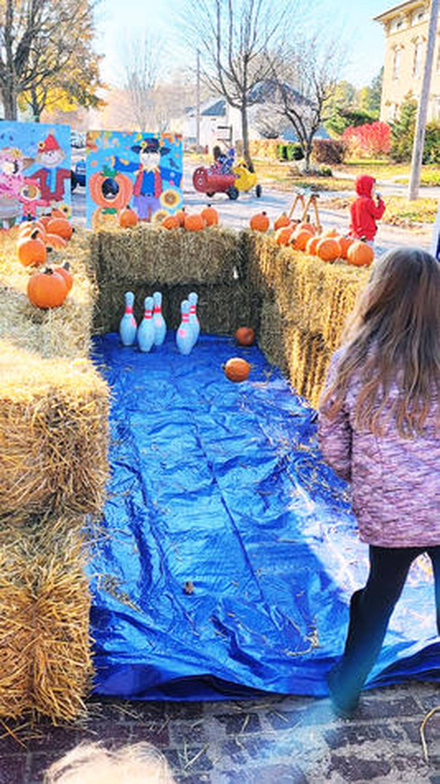 Pumpkin bowling is part of the fun at the Mount Carroll Pumpkin Fest on Saturday, Oct. 26, 2024.