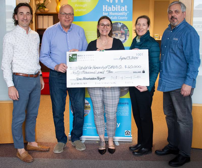 Habitat for Humanity of DeKalb County representatives receiving a $60,000 DeKalb County Community Foundation grant