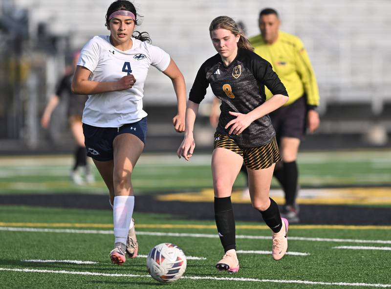 Joliet West's Sphia Podmolik (8) in action during the conference game against Plainfield South on Thursday, April. 24, 2025, at Joliet.