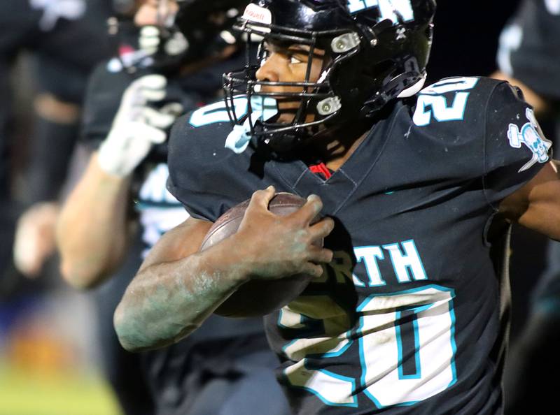 Woodstock North’s David Randecker runs the ball against Woodstock in varsity football at Woodstock North High School on Friday, October 24, 2025.