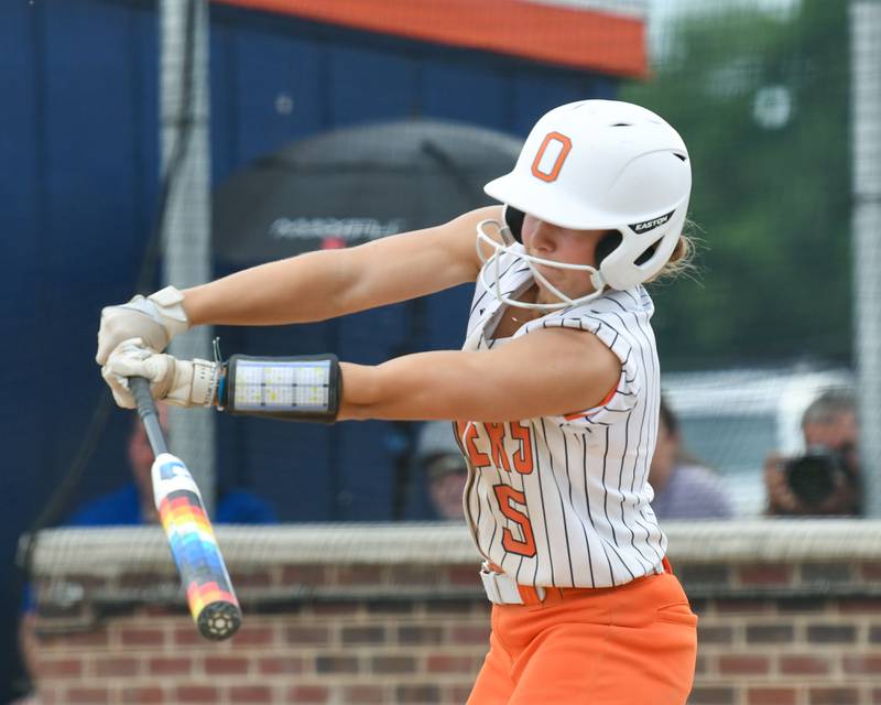Oswego's Adalynn Fugitt (5) makes contact with the ball during the sectional semifinals game on Tuesday June 3, 2025, while taking on Yorkville held at Oswego High School.