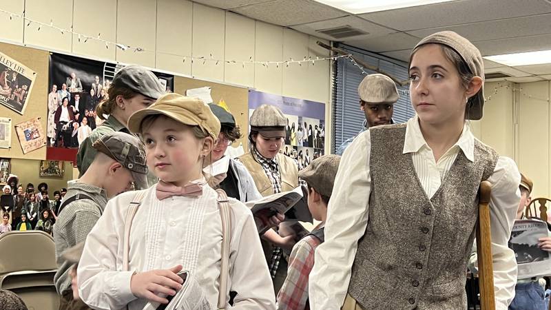Kiersten Massey, left, and Cadee Goldstein, right, rehearse at Somonauk Baptist Church on Jan. 26, 2023 ahead of a Children's Community Theatre of DeKalb production of Newsies, at the Egyptian Theatre the weekend of Feb. 10.