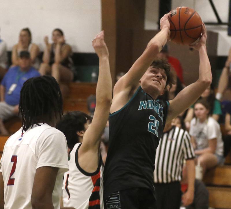 Woodstock North's Cade Blaksley is founded by McHenry's Hayden Stone during the boy’s game of McHenry County Area All-Star Basketball Extravaganza on Sunday, April 14, 2024, at Alden-Hebron’s Tigard Gymnasium in Hebron.