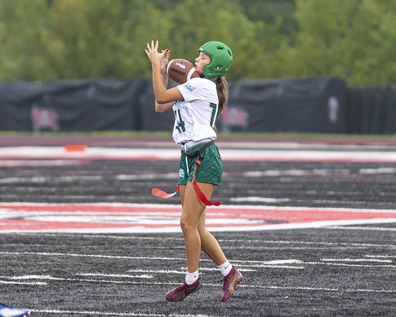 Plainfield Central's Madeline Barnes (14)  catches a pass during flag football game between Plainfield Central at Bolingbrook Wednesday, Sept 3, 2025 in Bolingbrook.