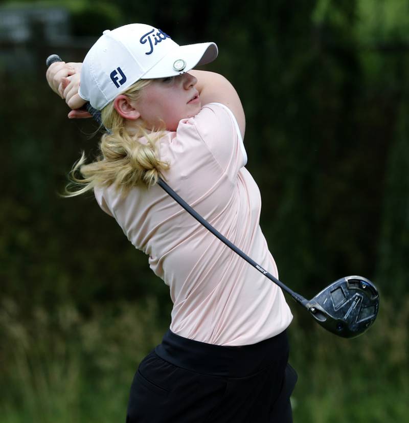 Vivian Overheidt watches her tee shot on the sixth hole during the final round of McHenry County Junior Amateur Golf Tournament  on Tuesday, July 18, 2025, at Foxford Hills Golf Club in Cary.