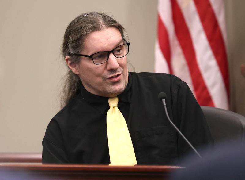 Craig Hurst, of Indiana, younger brother of Jonathan D. Hurst, testifies as a character witness Thursday, Jan. 30, 2025, during day six of the Hurst trial at the DeKalb County Courthouse in Sycamore. Hurst is charged in the 2016 killings of elderly mother and son Patricia and Robert Wilson in Sycamore.