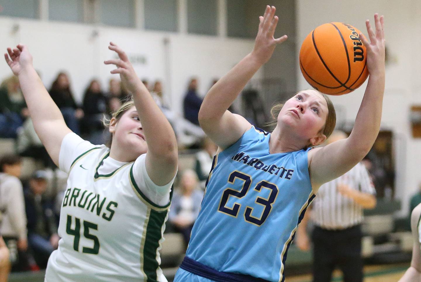 Marquette's Kelsey Cuchra grabs a rebound over St. Bede's Savannah Bray on Monday, Dec. 2, 2024 at St. Bede Academy.
