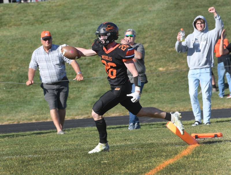 Milledgeville's Kolton Wilk scores a touchdown during second half action against St. Thomas More in 8-man football on Saturday, Oct. 22. The Missiles won the game 46-6.