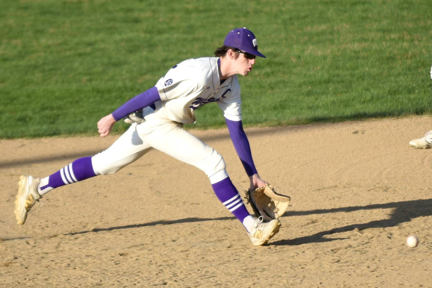 Wilmington's Ryan Kettman fields a ground ball during a home game against Herscher Tuesday, April 7, 2026.
