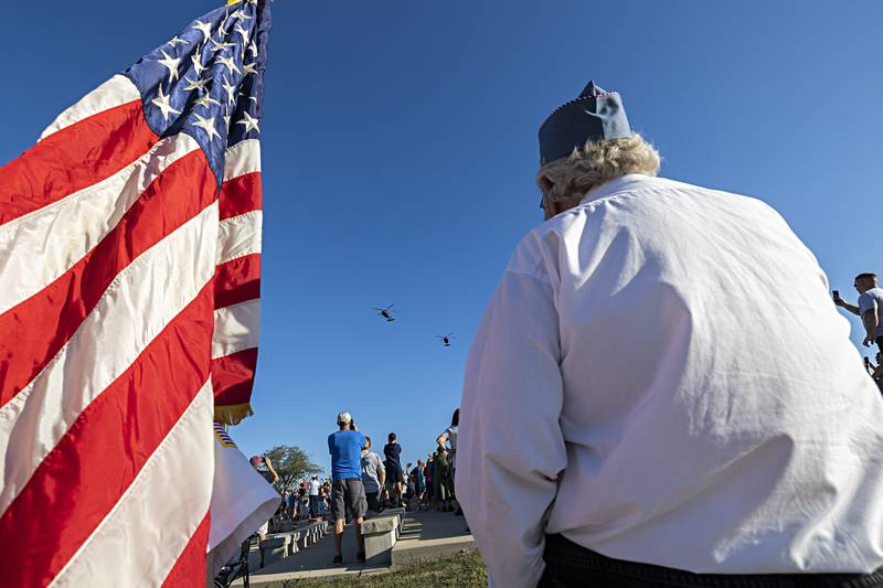 A pair of Blackhawk helicopters from the 106th AVN Regiment based in Kankakee soars over the opening ceremony Friday, Sept. 1, 2023 of the Vietnam Traveling Memorial Wall in Rock Falls.