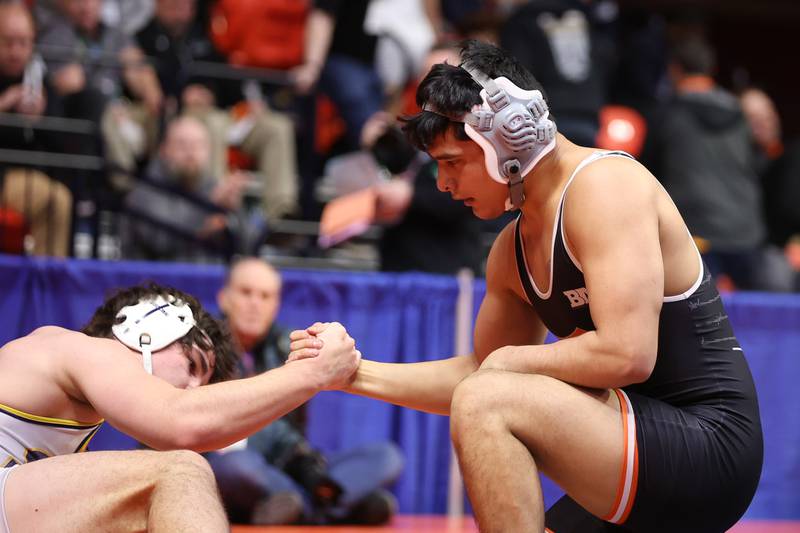 After his win Dekalb’s Damien Lopez helps up Glenbrook South’s Will Collins in the Class 3A 152lb. 3rd place match at State Farm Center in Champaign. Saturday, Feb. 19, 2022, in Champaign.