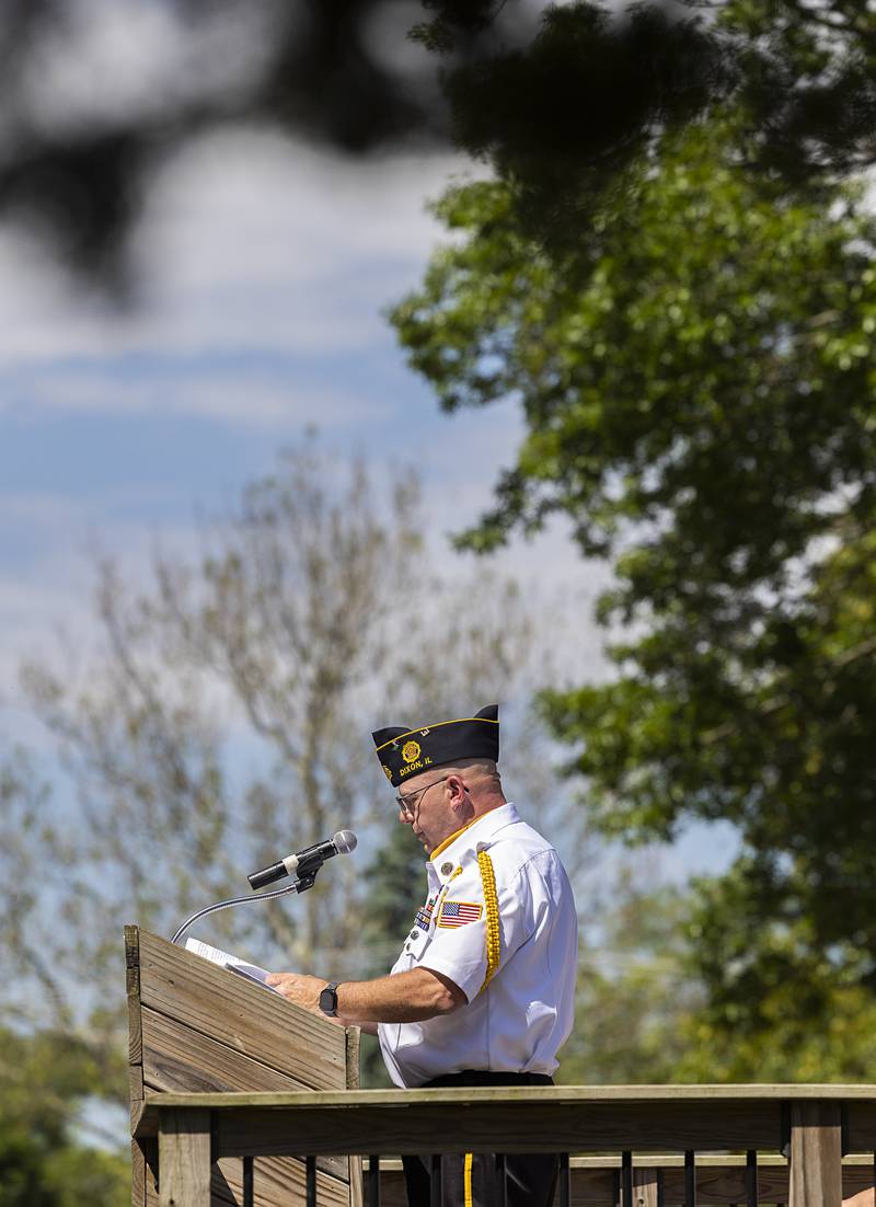 Keynote speaker David Hage speaks from the platform Monday, May 25, 2026, at Dixon’s Oakwood Cemetery in recognition of Memorial Day. Hage encouraged people to visit museums and battlefields to learn about the history of sacrifice.