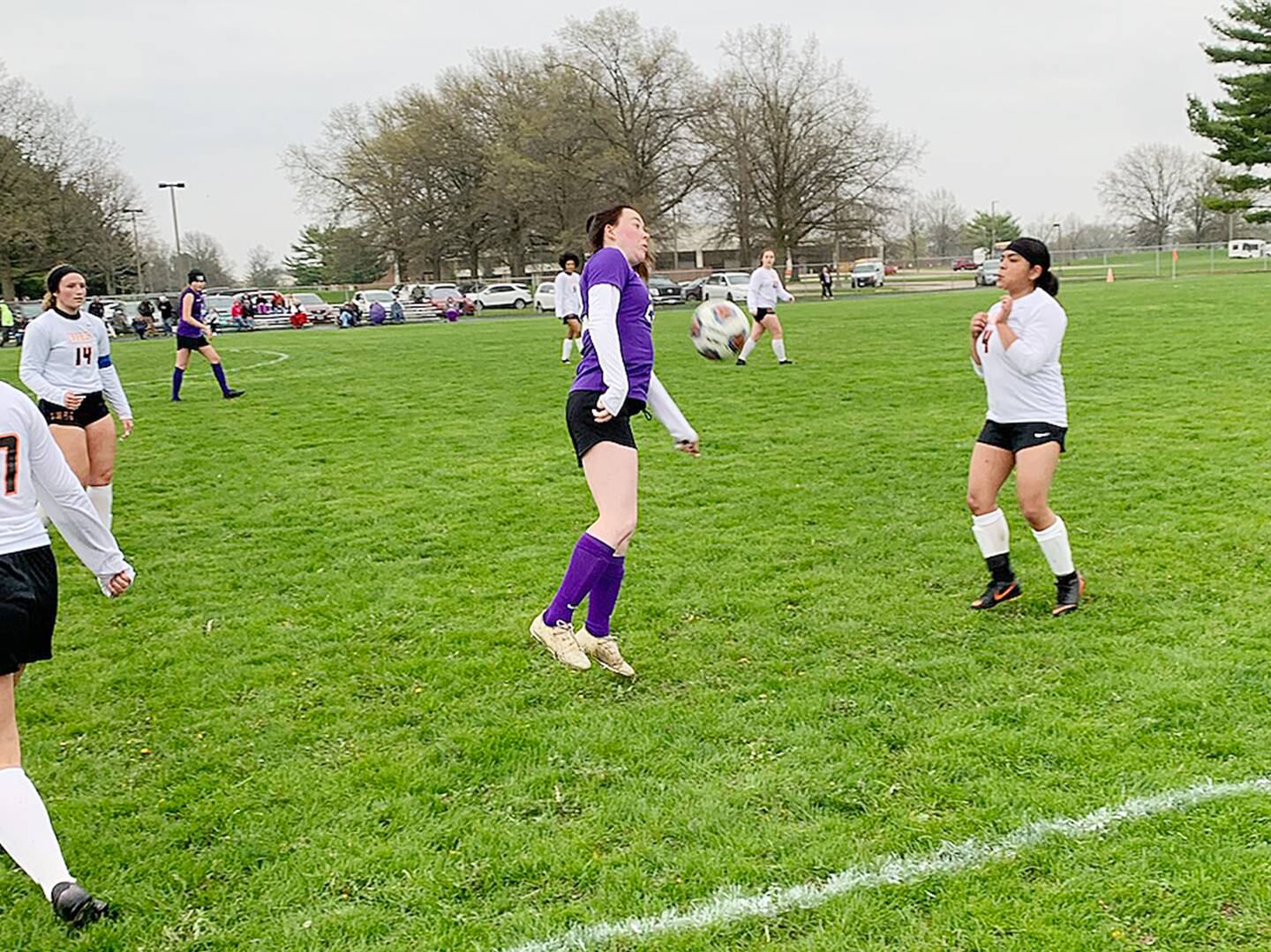 Dixon's Sydney Chesley tries to corral the ball in front of DeKalb's Laura Ovalle-Cruz (4) on Thursday, May 5, 2022.