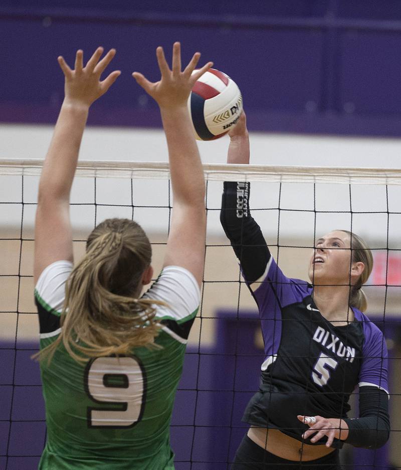 Dixon’s Morgan Hargrave plays the ball against Rock Falls’ Kayla Hackbarth Thursday, Sept. 18, 2025.