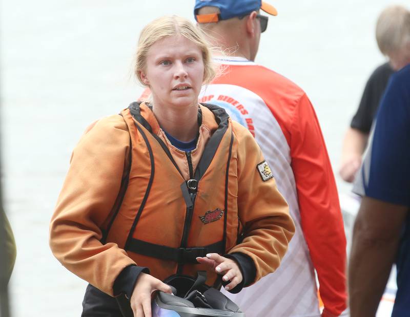 Morgan Bosnich of DePue, takes her helmet off after racing during The US Title Series (USTS) Pro National Championship Boat Races on Friday, July 25, 2025 in DePue.