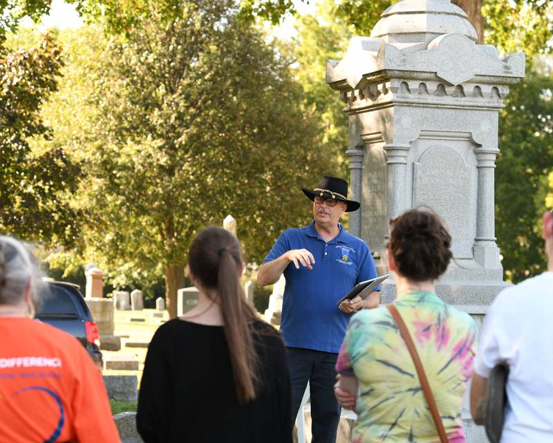 Lars Jacobson talks about John Black and some of his family during the Etched in Stone cemetery walk on Sunday Oct. 5, 2025, held at Elmwood cemetery in Sycamore.