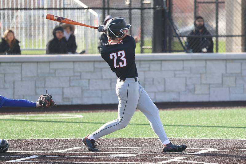 Minooka’s Landon Currie drives in two runs against Joliet Central on Monday, April 6, 2026 in Joliet.
