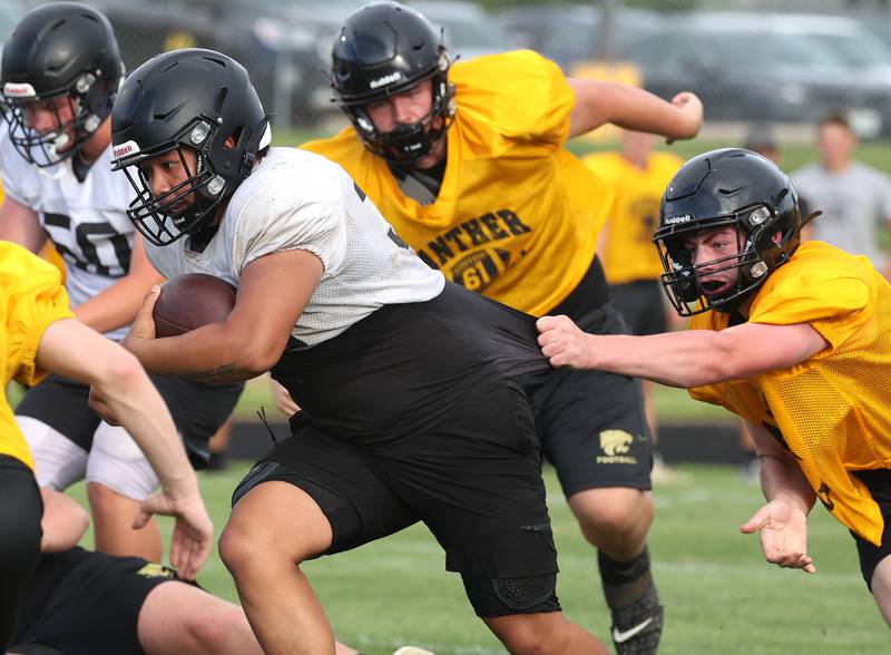 Lena-Winslow and Sycamore scrimmage Thursday, July 24, 2025, during a joint practice with Byron, Lena-Winslow and Sycamore at Sycamore High School.