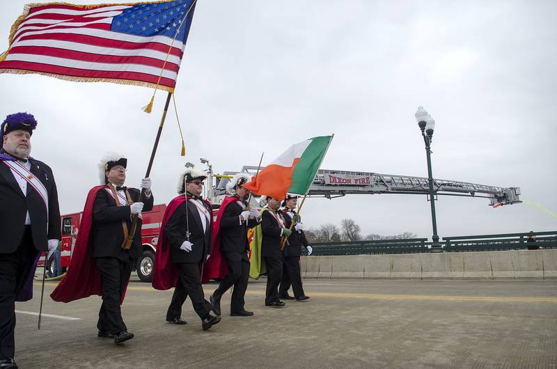 2016 File: The Color Guard of the Dixon Knights of Columbus walks past the Dixon City Fire Department's Tower 10 engine during the St. Patrick's Day parade.