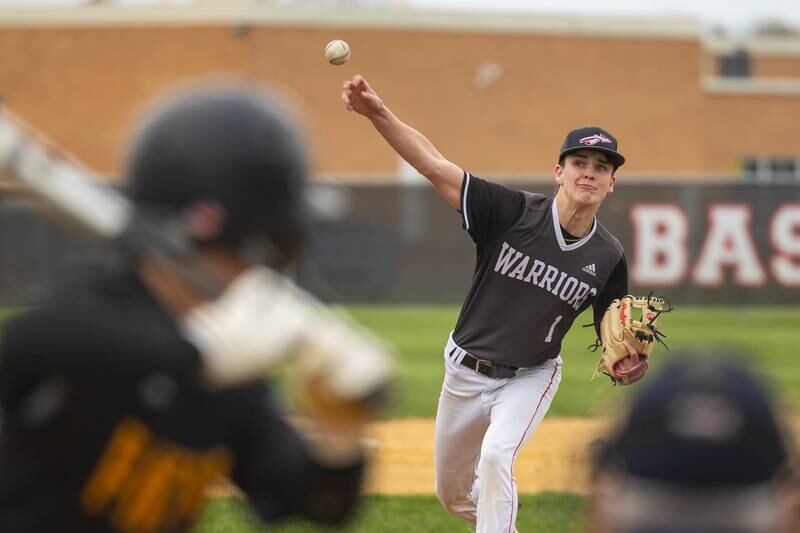 Nolan Price (1) of Woodland/Flanagan-Cornell pitches on Thursday, April 17, 2025 at Woodland High School in Streator.