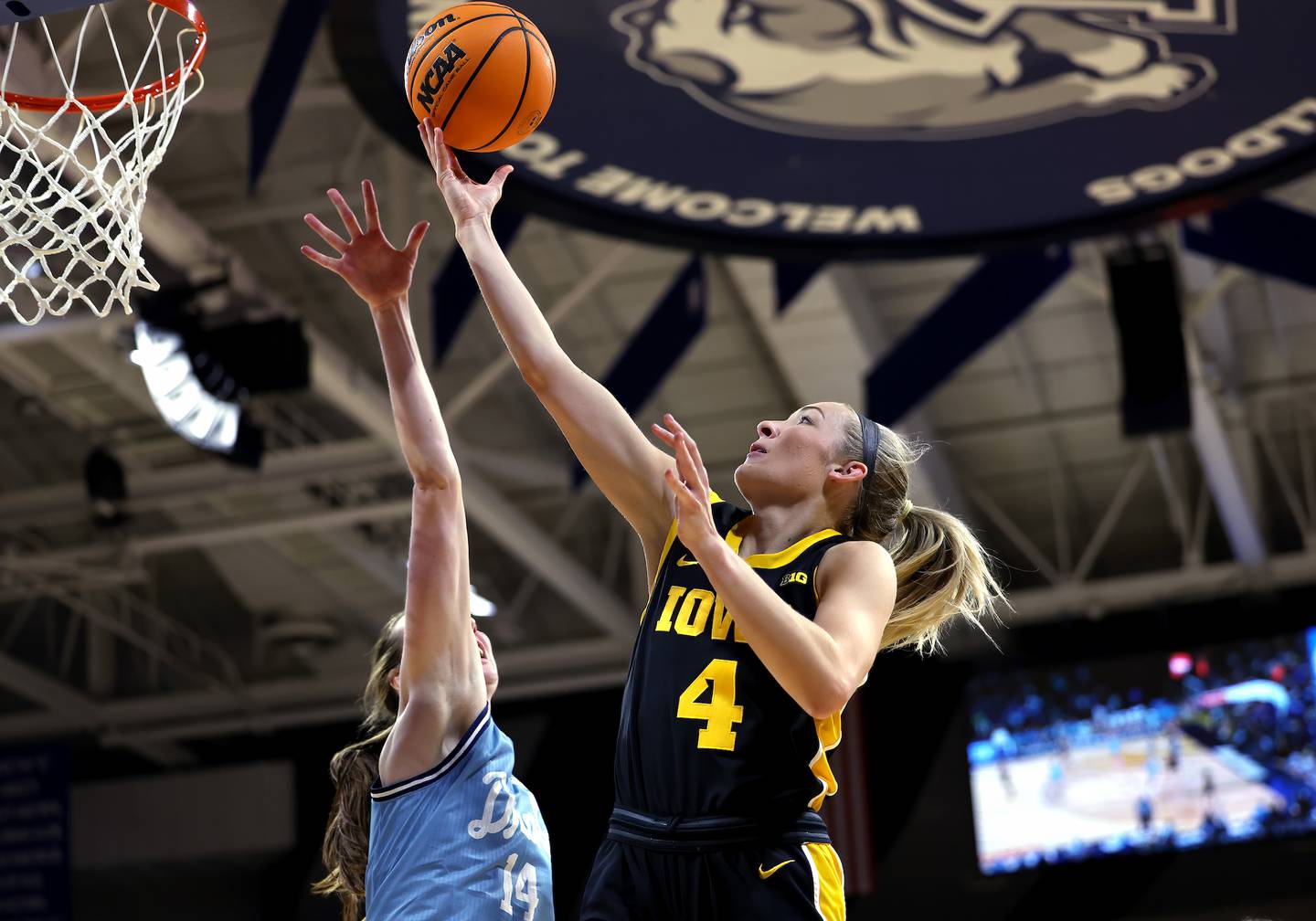 Iowa Hawkeyes guard Kylie Feuerbach (4) goes to the hoop against the Drake Bulldogs Sunday, November 17, 2024 at the Knapp Center in Des Moines. (Brian Ray/hawkeyesports.com)
