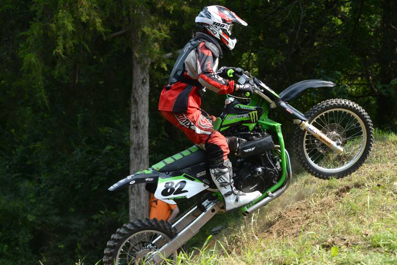John Fawley of Des Moines, Iowa, clears the hill and hangs on to his run at the Rock River Riders Motorcycle Club's hillclimb on Sunday, Aug. 3, 2025.
