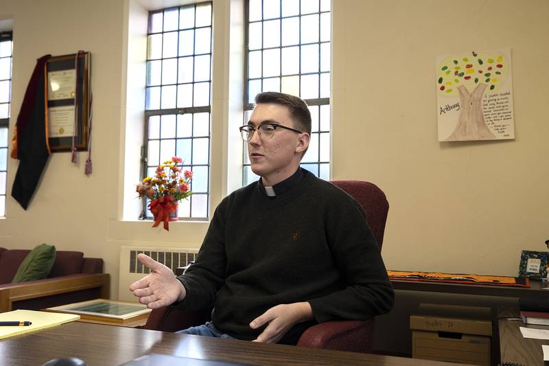 St. Paul Lutheran and Immanuel Lutheran Church co-pastor Anthony Windau speaks of the partnership with the two Dixon churches Thursday, Nov. 14, 2024, at his office at St. Paul’s. Windau co-pastors with his wife Riley Reed-Windau.