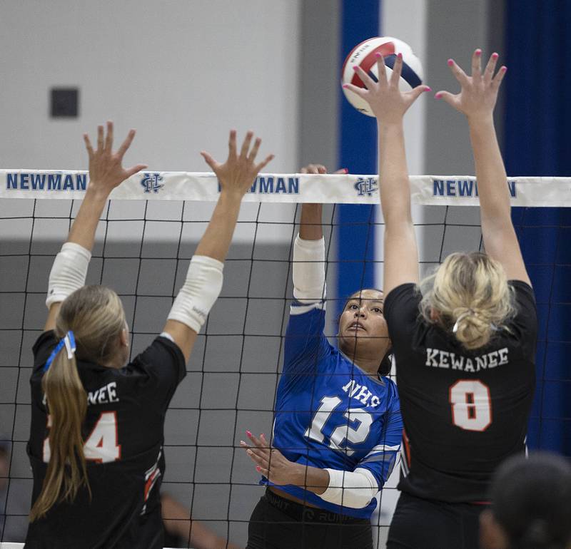 Newman’s Giselle Martin hammers a shot against Kewanee Tuesday, Sept. 16, 2025.