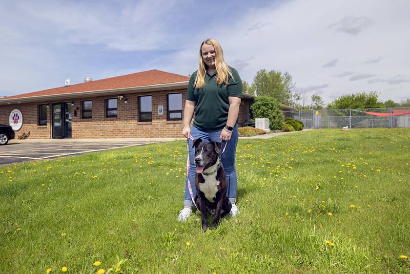Granny Rose volunteer Jayden Bonnell takes Lehman for a walk Friday, April 24, 2026, from Granny Rose Animal Shelter.
