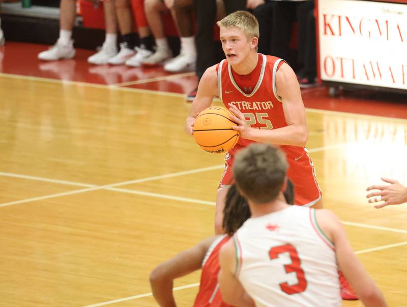 Streator's Joseph Hoekstra looks to pass the ball during the Dean Riley Shootin' The Rock Thanksgiving Tournament on Monday Nov. 24, 2025 in Kingman Gymnasium at Ottawa High School.