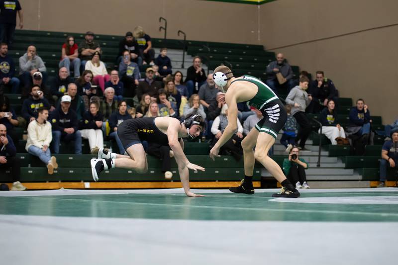 Yorkville's Ryan Alaimo, left, and Coal City's Luke Munsterman wrestle in the 138-pound match during the IHSA Class 1A Coal City Dual Team Sectional on Thursday, Feb. 5, 2026.