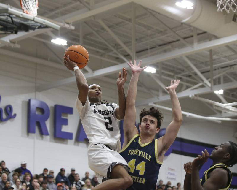 Kaneland's Isaiah Gipson puts up an acrobatic shot during their Plano Christmas Classic Championship basketball game between Yorkville Christian at Kaneland Tuesday, Dec 30, 2025 in Plano.
