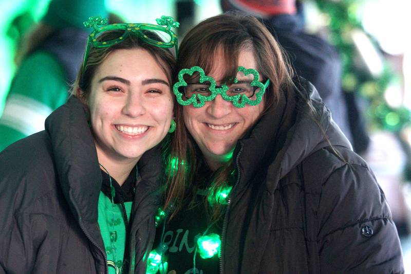 Lily Dower, left, and her mother, Kelly Dower of Vernon Hills, attend the ShamROCKS the Fox Festival in McHenry Friday, March 17, 2023.