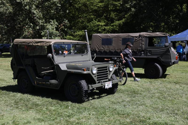 A fully restored 1967 US Marine Corp Jeep and 1972 Suisse Armee Pinzgauer sit on display at the 11th Annual Operation Firm Handshake Veteran’s Picnic on Saturday, Sept. 7, 2024 in Coal City.