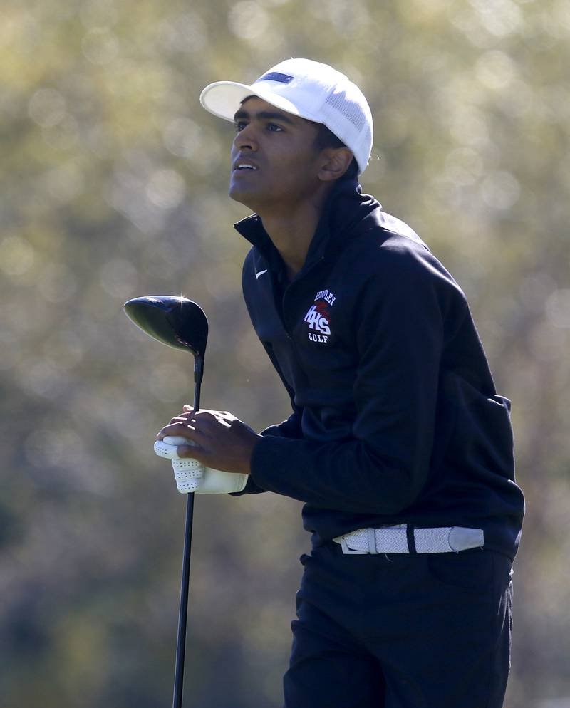 Huntley’s Taig Bhathal watches his tee shot in the ninth hole during the IHSA Class 3A Jacobs Sectional golf tournament on Monday, Oct. 7, 2024, at Randall Oaks Golf Club in West Dundee.